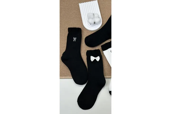 Representative commercial sample visual for Custom Bow Crew Socks SKU 1157 in the DK Marketplace.