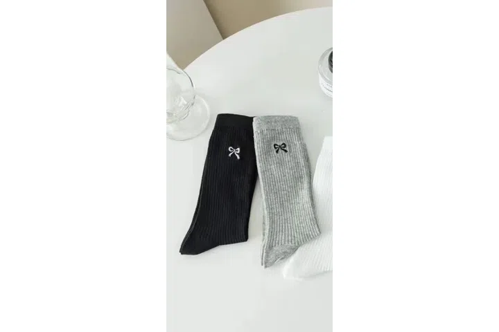 Representative commercial sample visual for Custom Bow Crew Socks SKU 912 in the DK Marketplace.