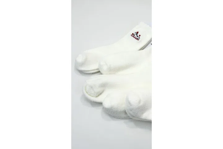 Representative commercial sample visual for Custom Fuzzy Cartoon Crew Socks SKU 1162 in the DK Marketplace.